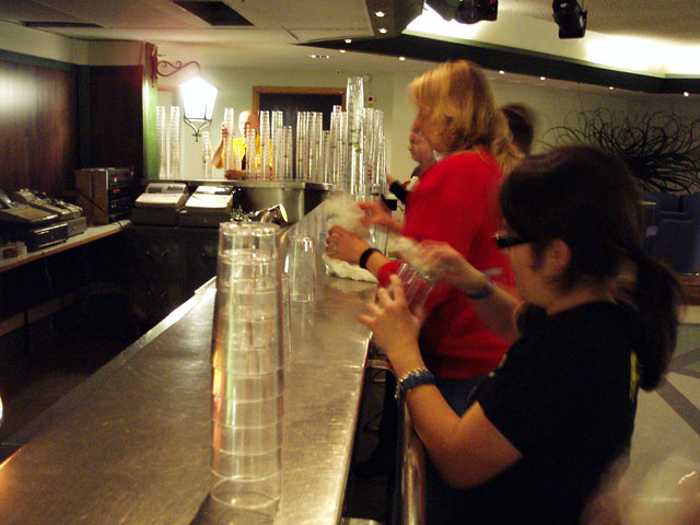 The glasses are being cleaned and dried